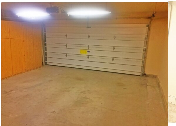 2 car garage with cabinet storage - 154 Baxter Ave