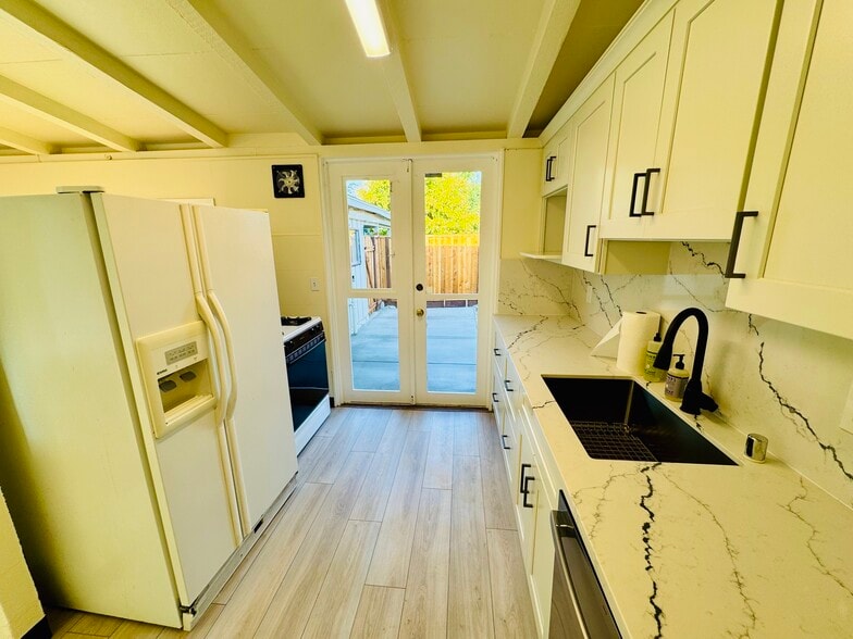 Kitchen and Side Door - 10349 Menhart Ln