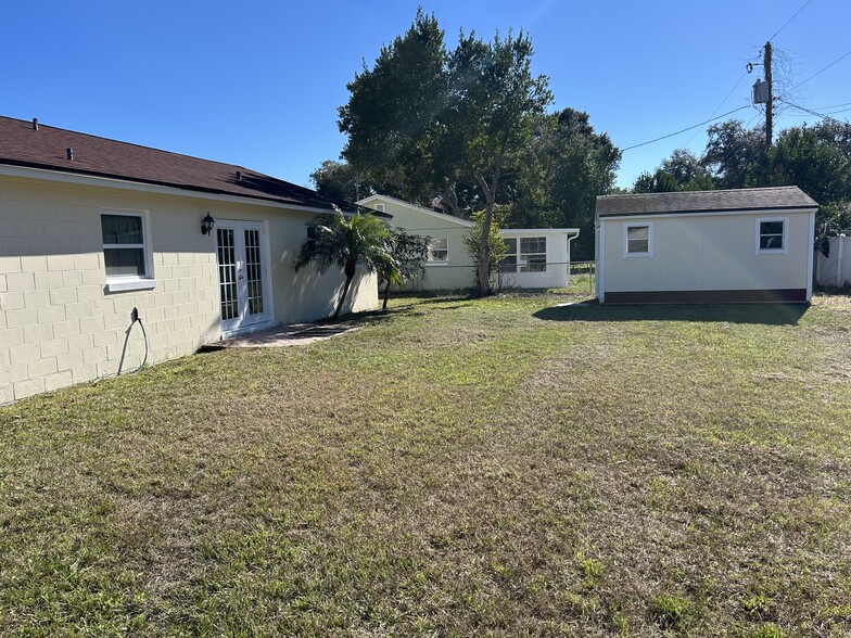 Backyard view with a large shed - 134 Burns Ave