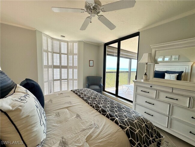 Building Photo - 6075 Pelican Bay Blvd