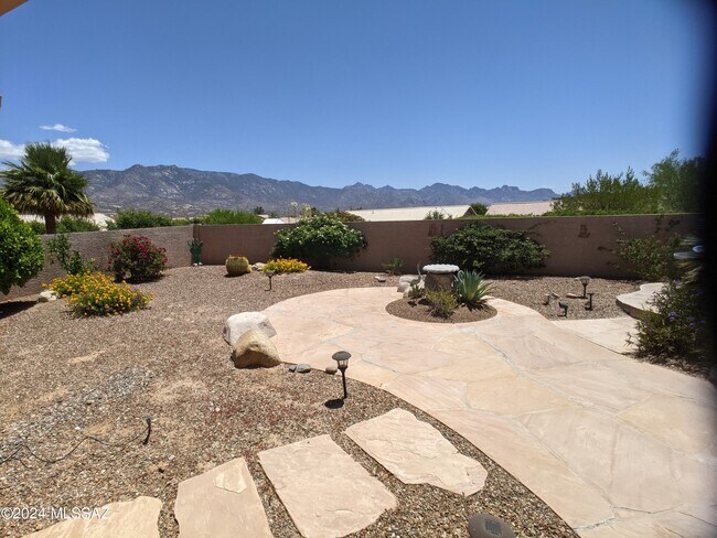 Building Photo - 63945 E Orangewood Ln