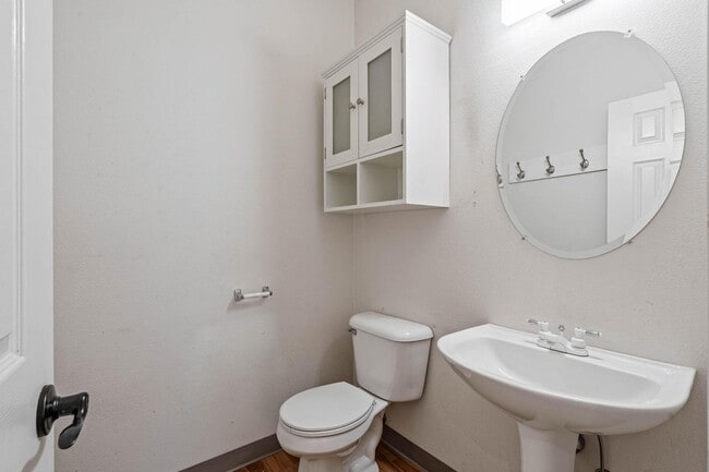 Building Photo - $500 move-in special! Unique 2-bdrm/2.5-bath duplex w/ A/C—Private patio, storage, garage w/ wash...