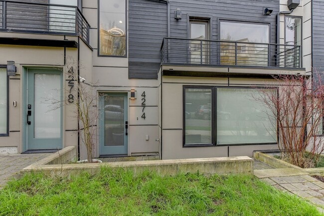 Building Photo - Smart Layout, Prime Location, and a Rooftop That Seals the Deal