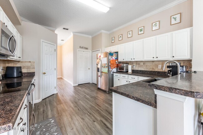 Building Photo - 4956 Grand Lakes Dr N
