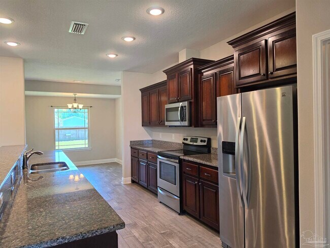 Building Photo - 8839 Longmont Way