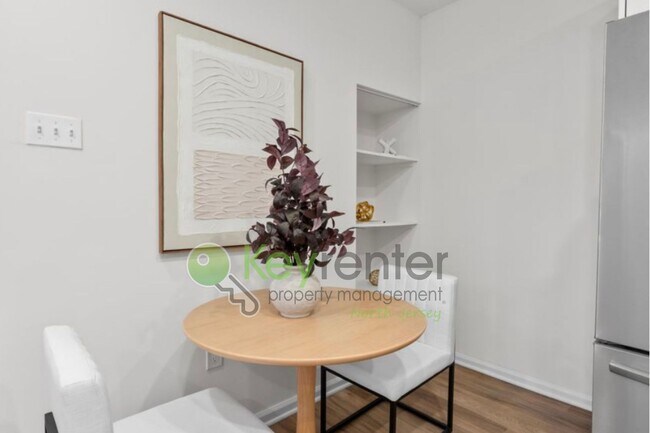 Building Photo - Rare Renovated 3BR/2BA Townhouse with Private Yard & NYC Views