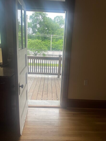 Kitchen pic 3 view toward back deck - 6042 Pershing Ave