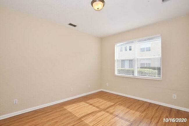 Building Photo - Beautiful 3/3.5 Townhome with a Spacious 2 Car Garage in the Gate Guarded Community of Spring Isl...