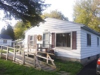 Building Photo - Charming 2-Bedroom Home on Double Lot – Av...