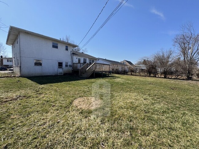 Building Photo - 4 bedroom, 2 bath home now available!