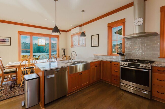 Building Photo - Impeccable Low Bank Bainbridge Waterfront Home with Private Dock