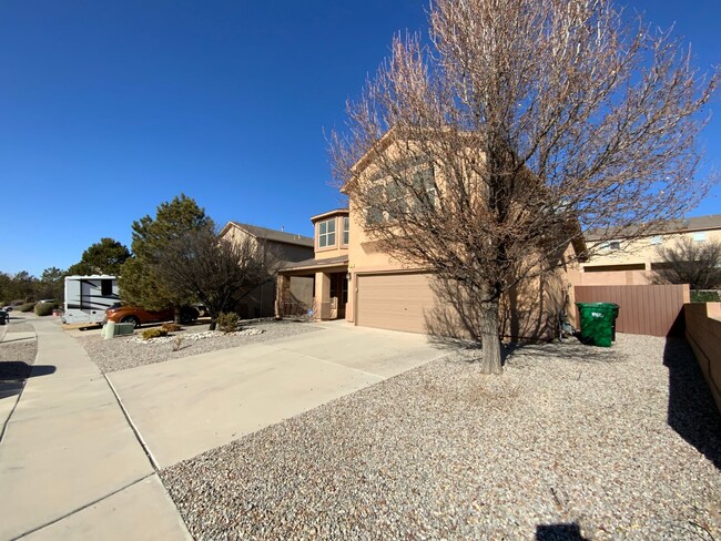 Building Photo - 4 Bedroom Home Available Near Unser Blvd N...