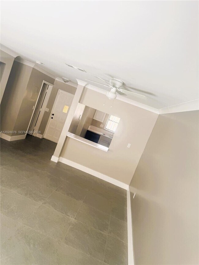 Building Photo - 10787 Royal Palm Blvd
