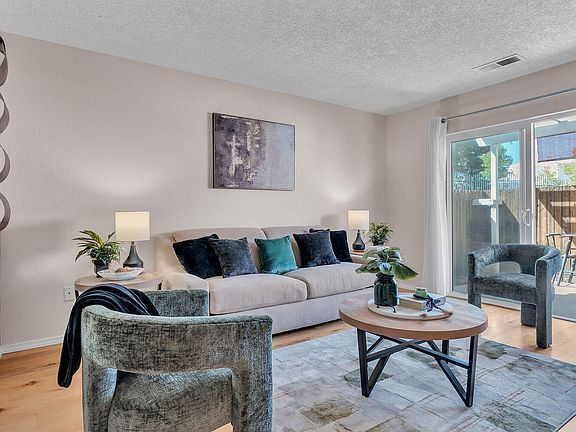 Building Photo - Single-level living at its finest! This co...