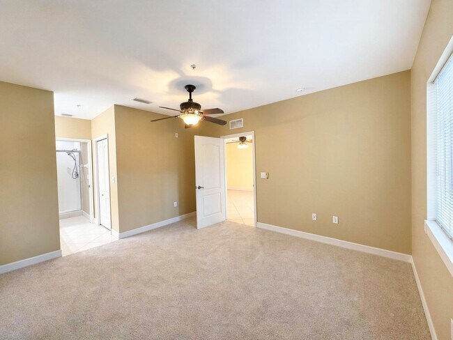 Building Photo - AVAILABLE NOW! Top-Floor Condo | Gated Community | Preserve Views | Water, Sewer & Cable Included