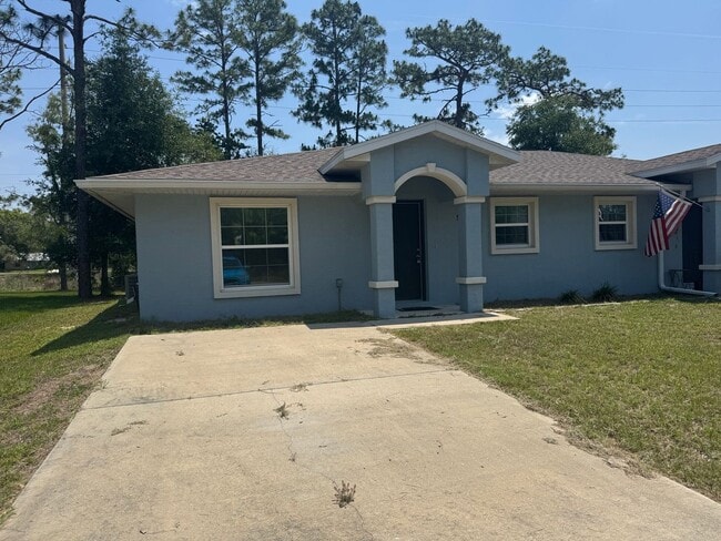 Building Photo - Charming 2BR/2BA Duplex in Citrus Springs - Peaceful Living Awaits!