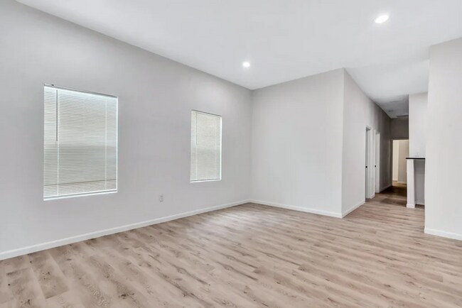 Building Photo - Renovated and full of character, this 3-be...