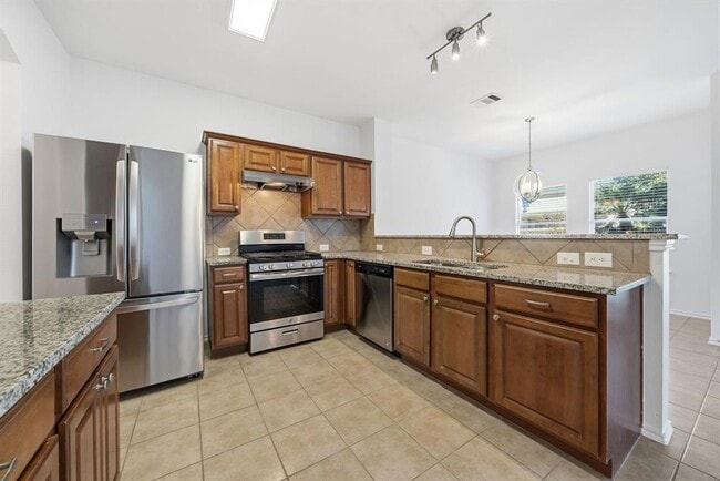 Building Photo - 5712 Zachary Scott St