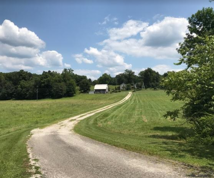 As you drive in, the house is set well off the road. - 7502 Borden Rd