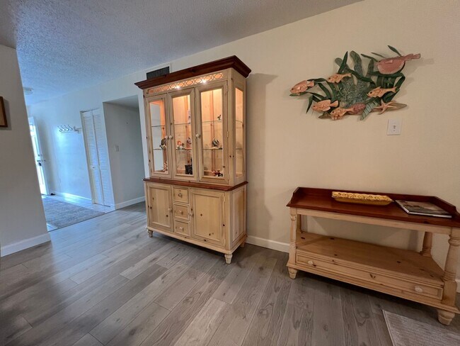 Building Photo - *55+ Community* 2nd floor furnished Condo