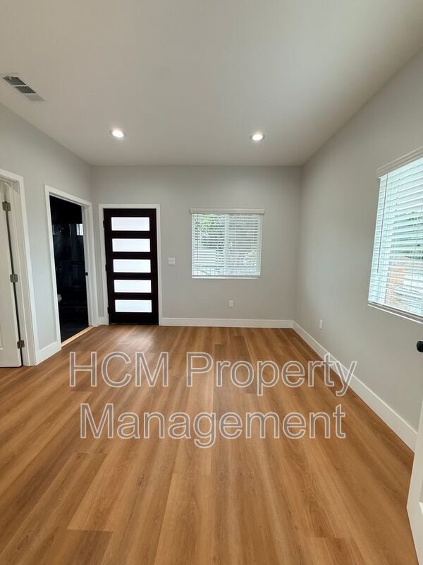 Building Photo - 5233 Bellflower Blvd