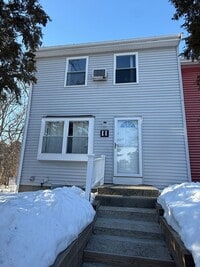 Building Photo - A two bedroom, 1 and a half bath unit in Townhouse. Unit 11-$2,800 per month plus utilities