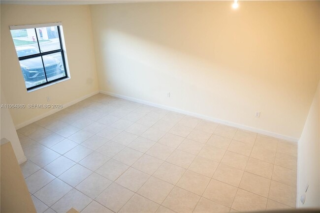 Building Photo - 11091 W 32nd Ln