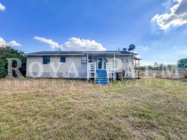 Building Photo - 4 Bedrooms, 2 Bathrooms & a Huge Backyard — Spacious Lehigh Acres Home with Pet-Friendly Living o...
