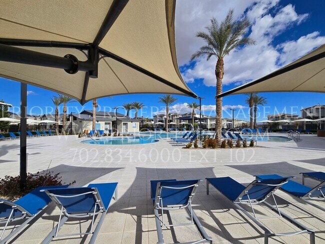 Building Photo - Gated~ 2 Bedroom Townhome w/2 Car Garage~MUST SEE!