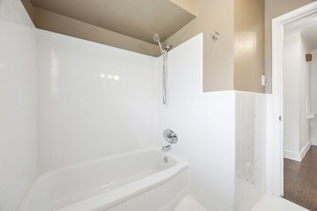 Building Photo - **$40K+ IN UPGRADES AND A FENCED BACKYARD WITH TWO STORAGE BUILDINGS**