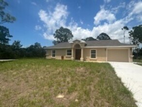 Building Photo - 3/2/1 Single Family Home Available-Cozy Pe...