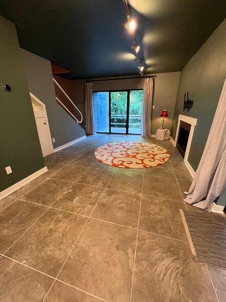 living area, deck to right and ahead - 130 E Longview St