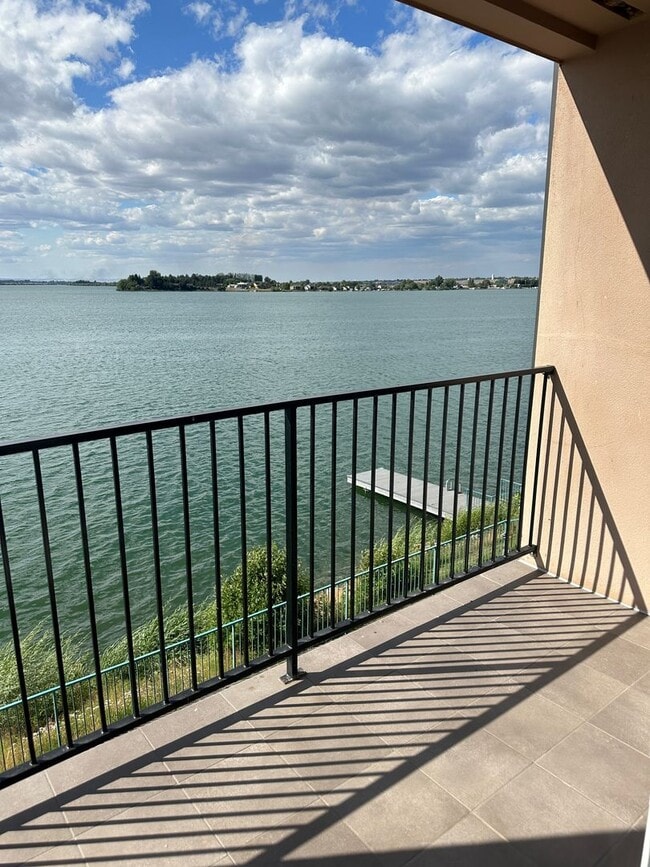 Building Photo - Beautiful Lakefront Condo! WSG & PUD Included!