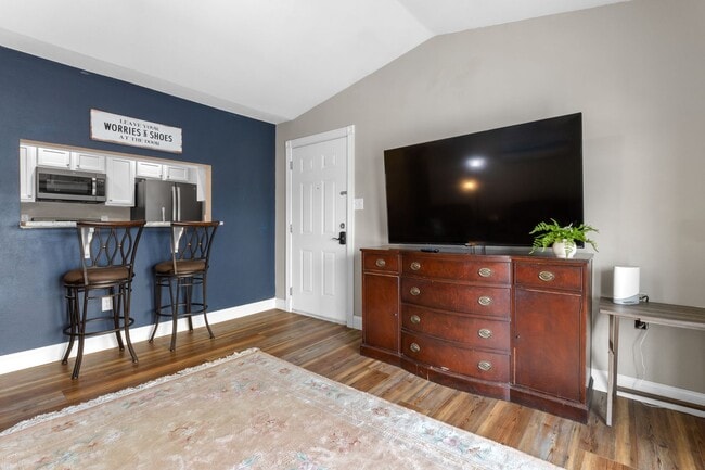 Building Photo - Welcome to Coastal Living at Harbor Landing Condominiums!