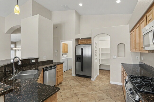 Building Photo - Immaculate 5-Bed, 3-Bath Entertainer’s Home on Over a Quarter Acre in Gated Riverwalk Ranch Manor...