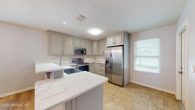 Building Photo - 13290 Pacemaker Dr