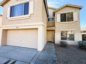 Building Photo - Spacious & Stylish in the Heart of Surprise!