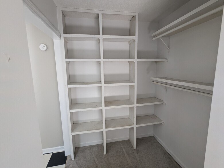 walk in closet with cubbies - 1528 Stone Hill Rd