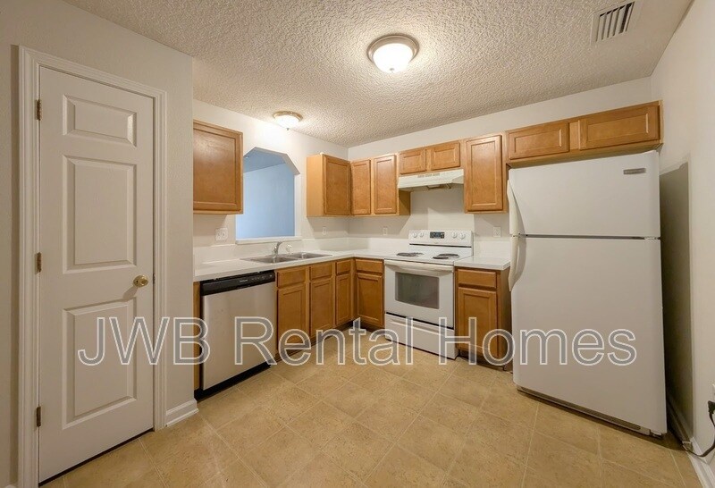 Building Photo - 8473 McGirts Village Ln