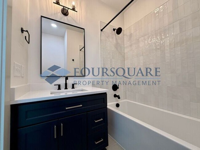 Building Photo - Modern 4-Bed Townhome with Designer Finishes, Dual Balconies & EV-Ready Garage – Inside the Beltl...