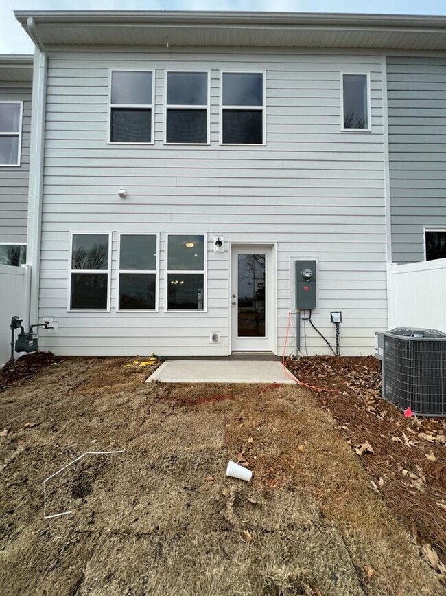 Building Photo - Townhome with 3BR/2.5BA Garage Located in ...