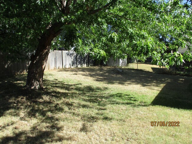 Building Photo - 6421 Woodcreek Trail