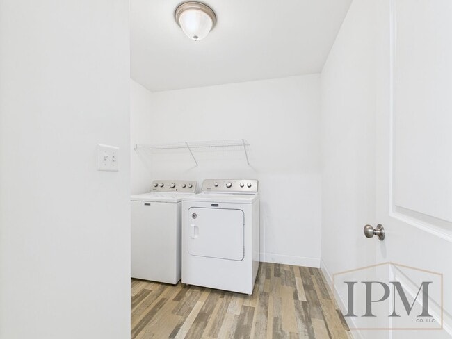 Building Photo - 2-bedroom 2.5 bath Luxury Townhome located...
