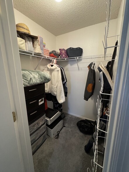 master walk in closet - 327 Lake Daisy Loop