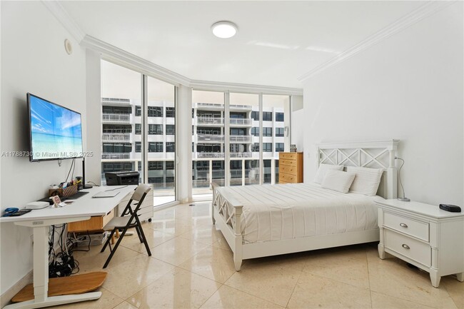 Building Photo - 10225 Collins Ave