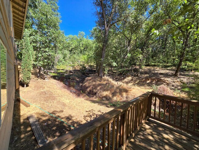 Building Photo - charming 3-bedroom, 2-bathroom home with l...