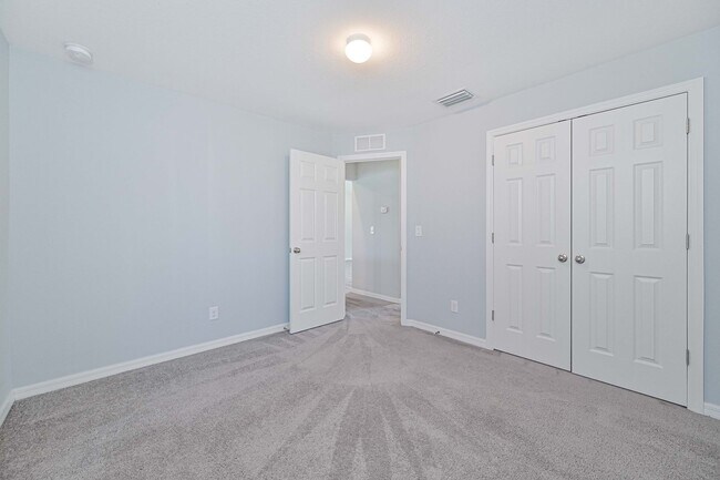 Building Photo - Spacious Three-Bedroom Home with Open Floor Plan, Large Yard