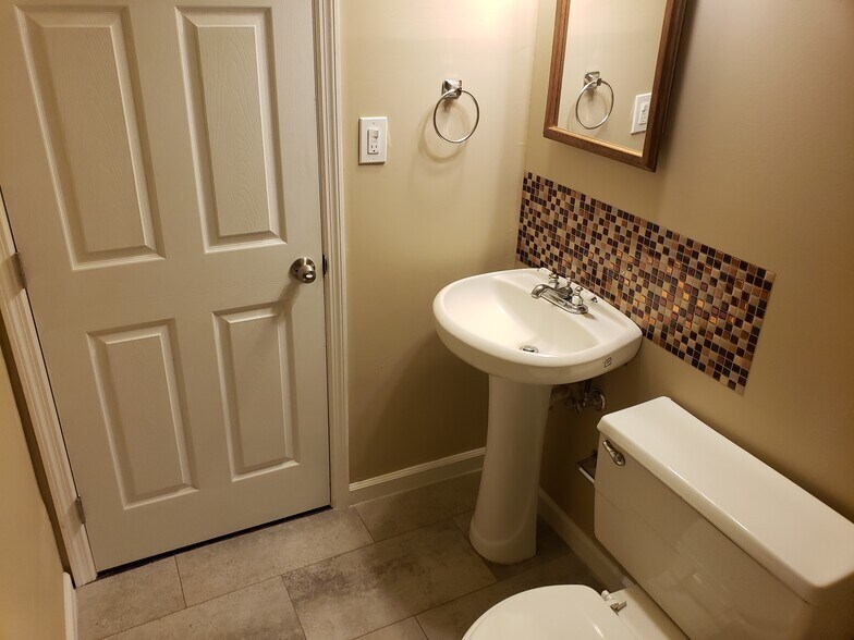 Bathroom #1 Pedestal sink and toilet view - 43 Lissner Ave