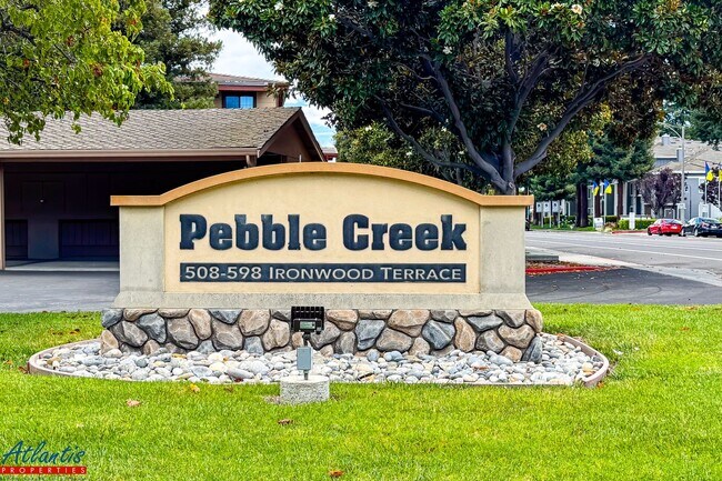 Building Photo - Pebble Creek | Lovely Condo | Prime Location