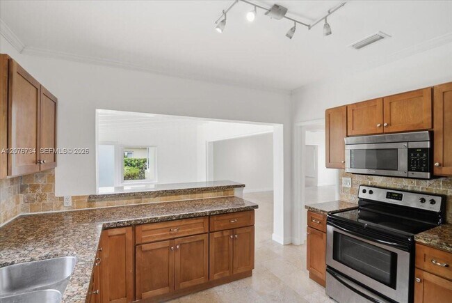 Building Photo - 8975 Froude Ave